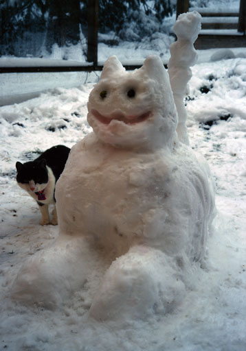 Study in Snow #1. by Joseph Howse. Portraying Plasma Tigerlily Zoya with Samuel Howse's sculpture of Dr. L. S. River, NummNumm. February 2006.